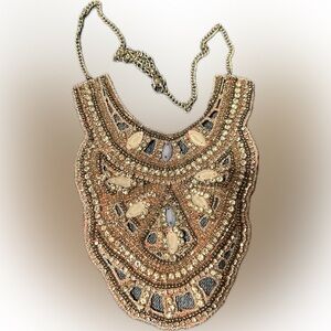 Bib necklace cubic zirconia , baby blue, and white gems hand sewn in lgt pink